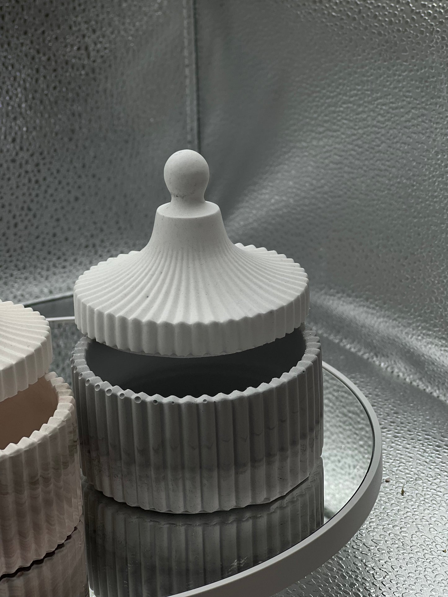 Concrete jar with decorative candle