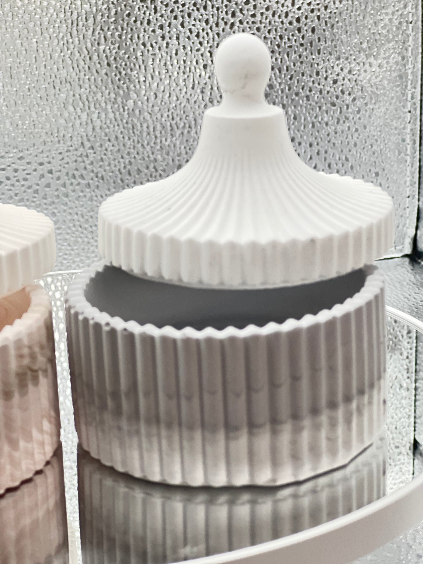Concrete jar with decorative candle