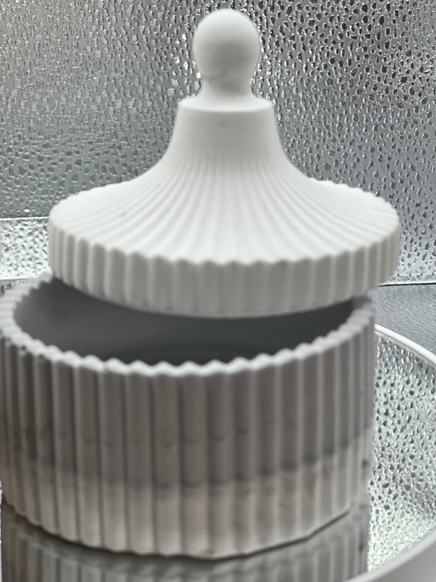 Concrete jar with decorative candle