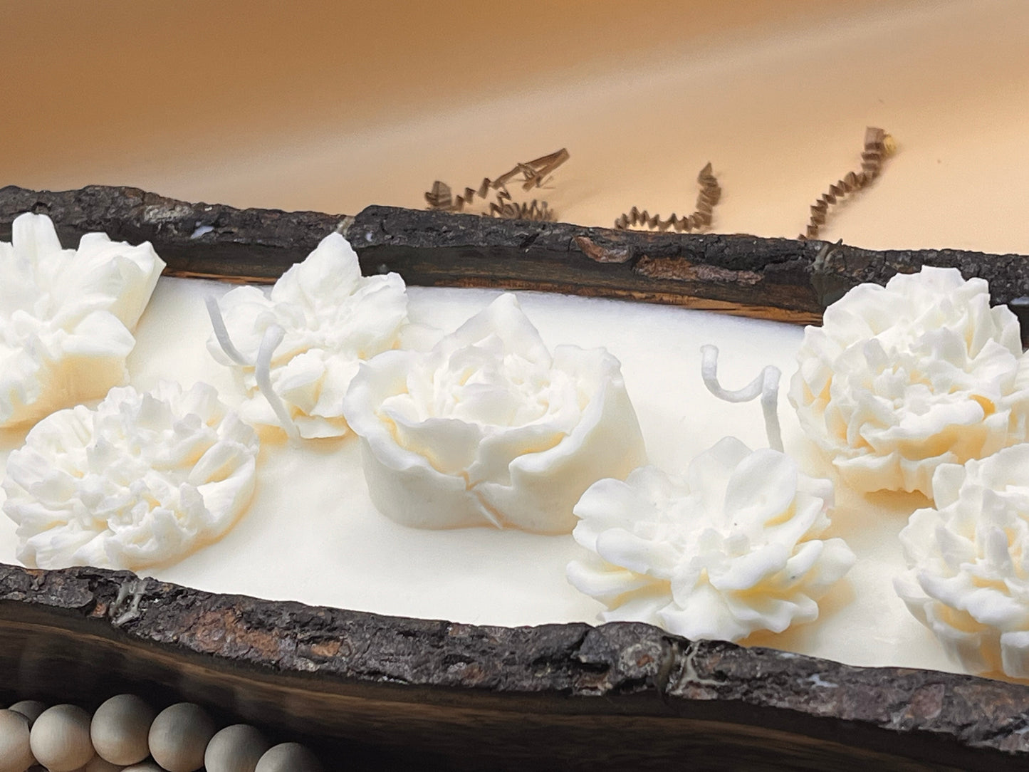 Wooden dough candle with decorative flowers